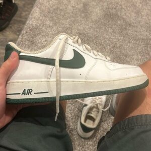 nike air force green sole and nike symbol
